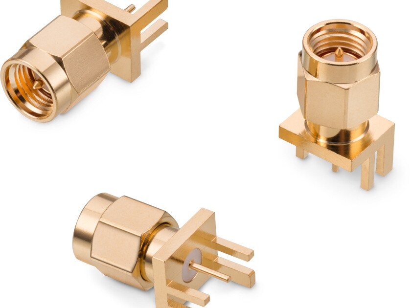 Three golden PCB connectors on white background