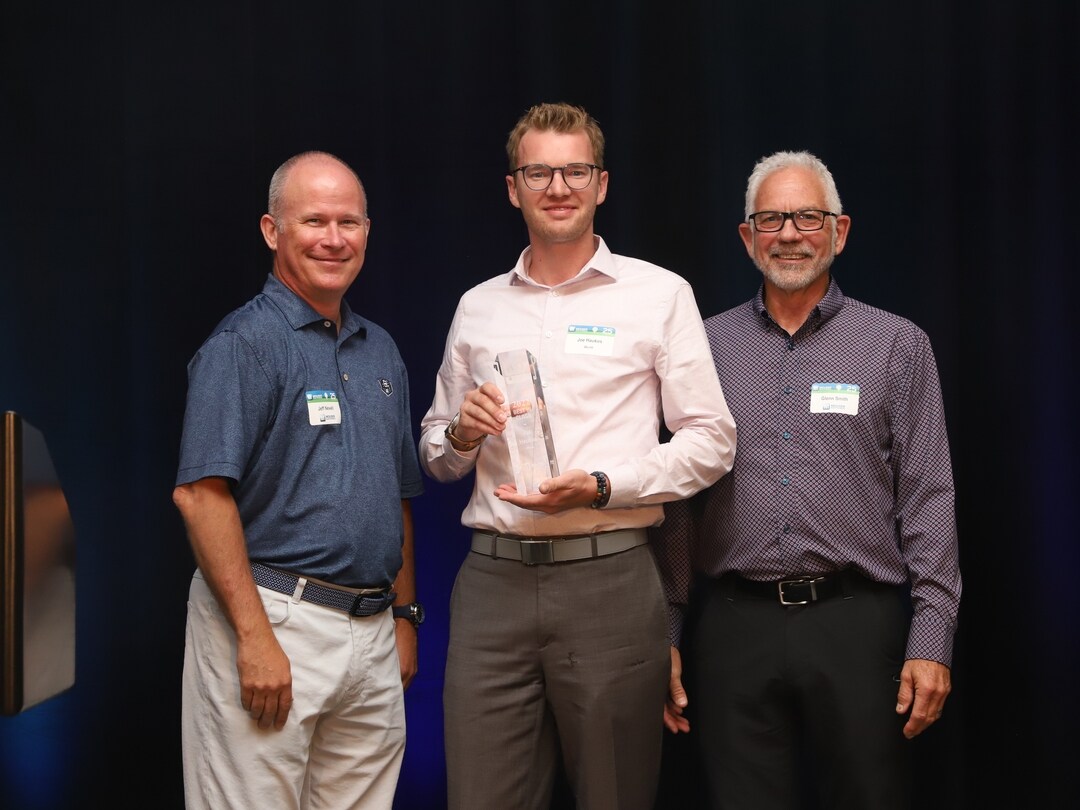 Drei Personen mit dem best-in-class award