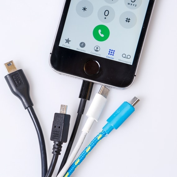 Smartphone with several charging cords