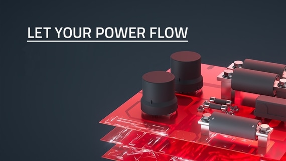 ICS HV PDU let your power flow Vehicles on illuminated road with slogan "Let your power flow"