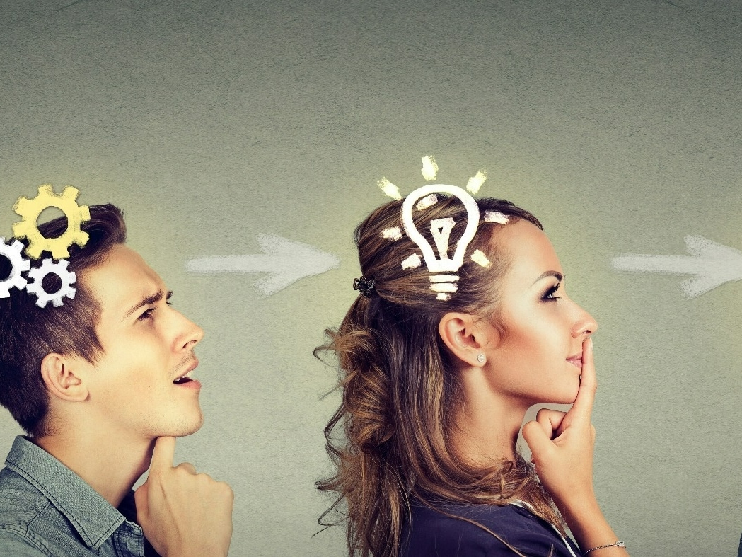 Woman and man acting out brainstorming