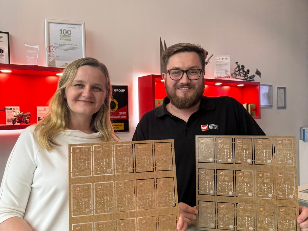 recycable PCB Soluboard in hands of Alina Schreivogel and colleague from Asia Production
