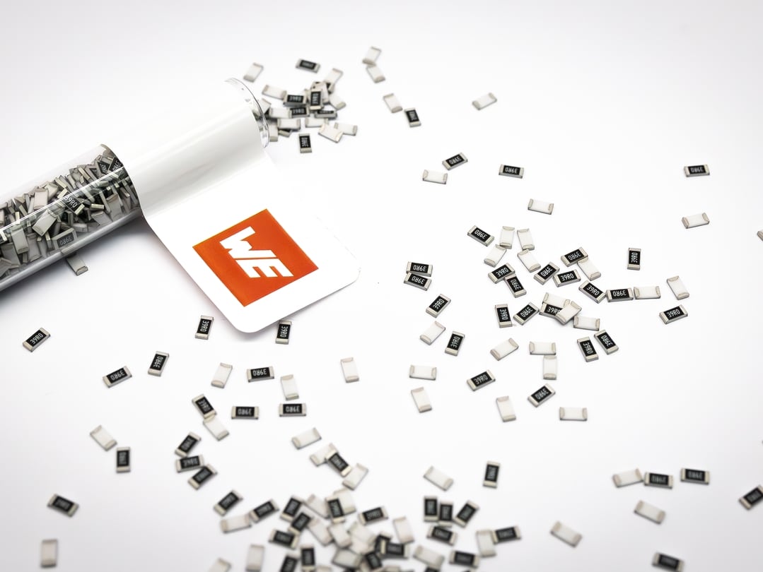 The small black thick film resistors on a white background