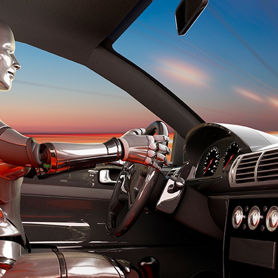Ein Crash Test Dummy am Lenkrad eines Fahrzeugs