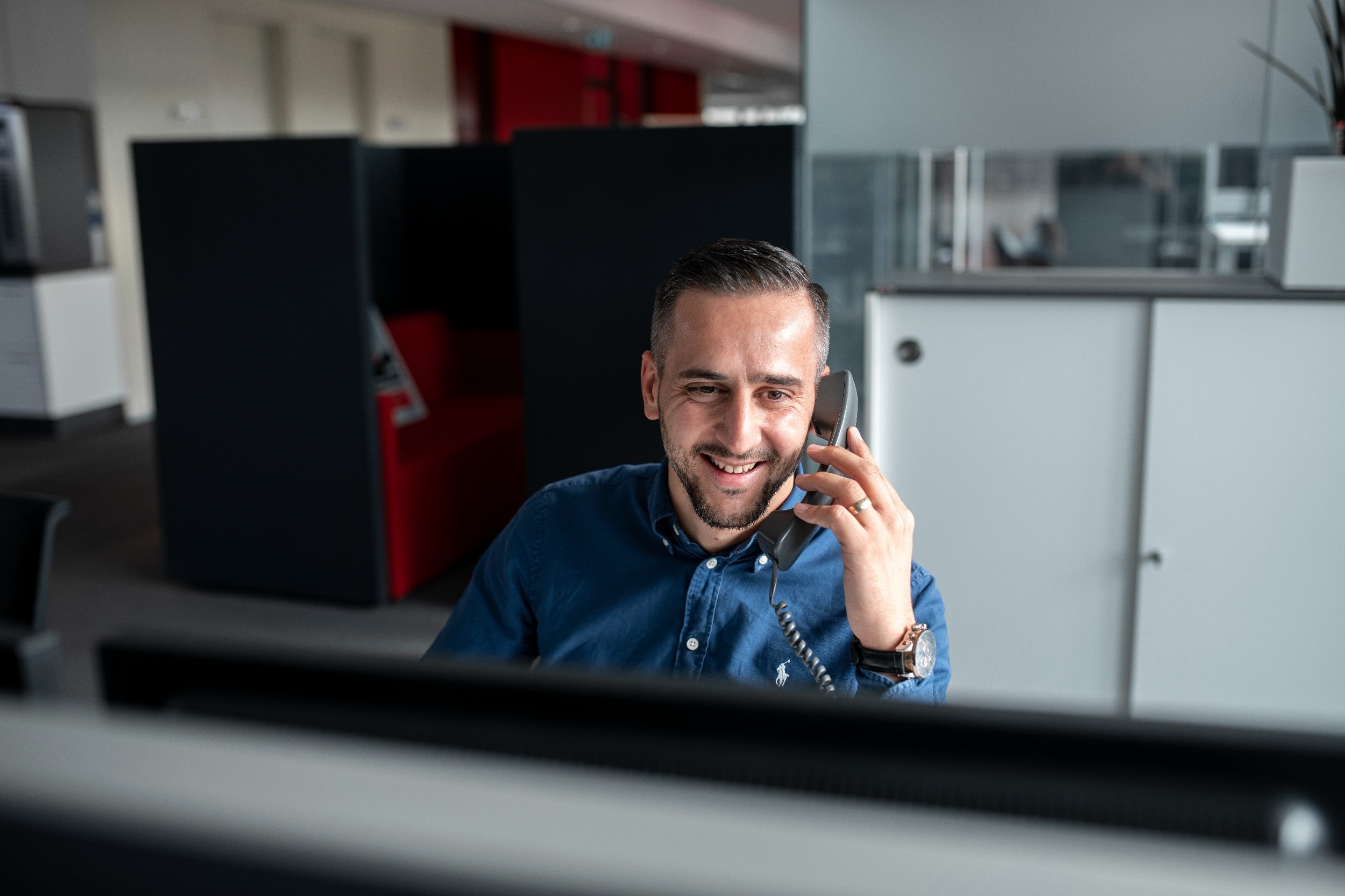 Employee on the service phone Employee on the phone