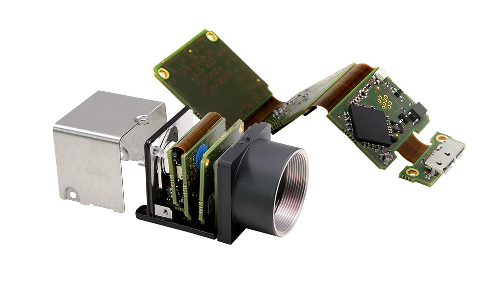 Image showing a multiply bent RIGID.flex PCB alone and also mounted in a smart camera